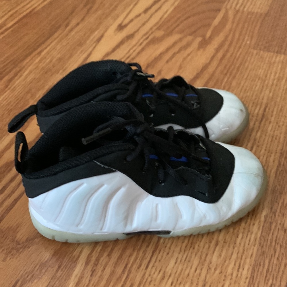 White and black Nike posite